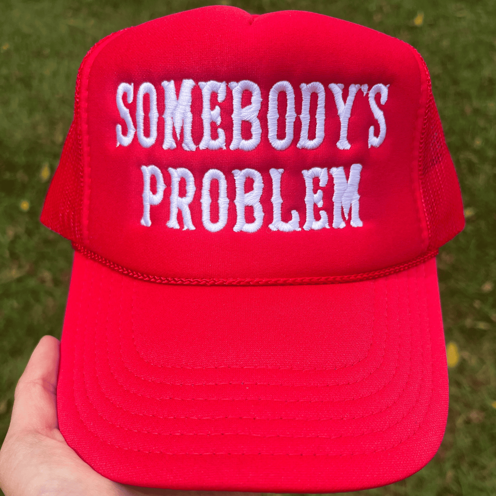 Somebody's Problem Embroidered Trucker Hat